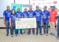 FMU SMILES TO THE BANK WITH KCB HEFTY CHEQUE